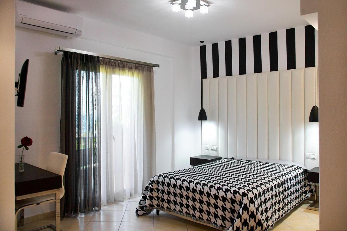 Stamos Apartments And Studios 沃尔沃罗 外观 照片